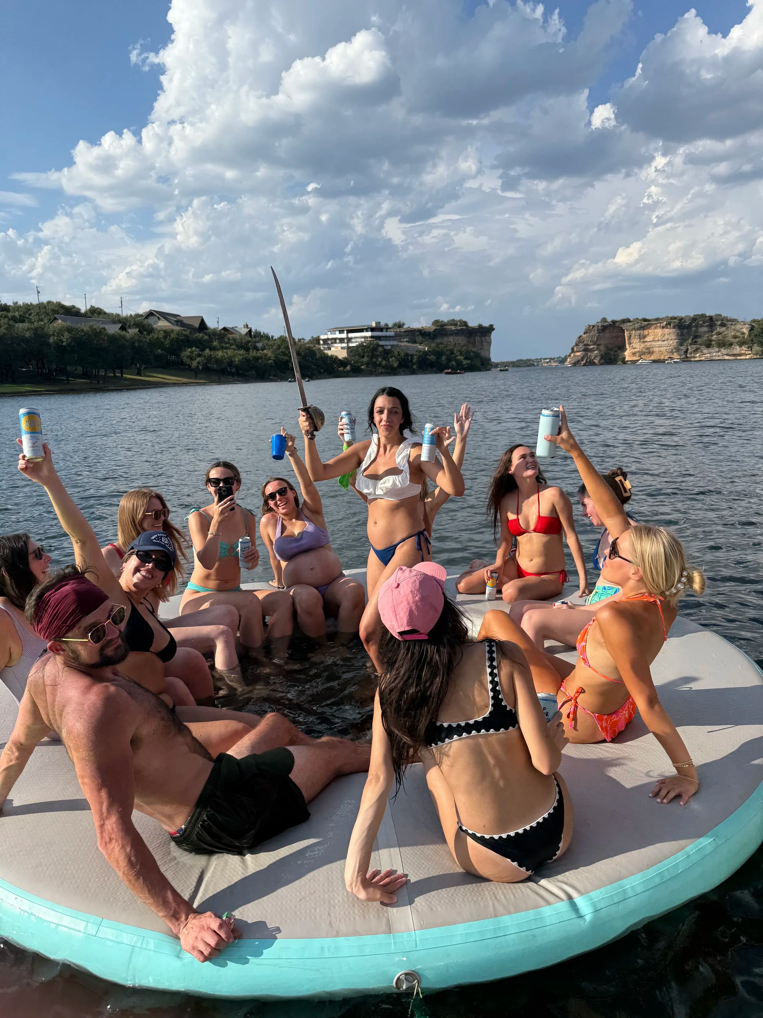 Guests on the circular float with lake views